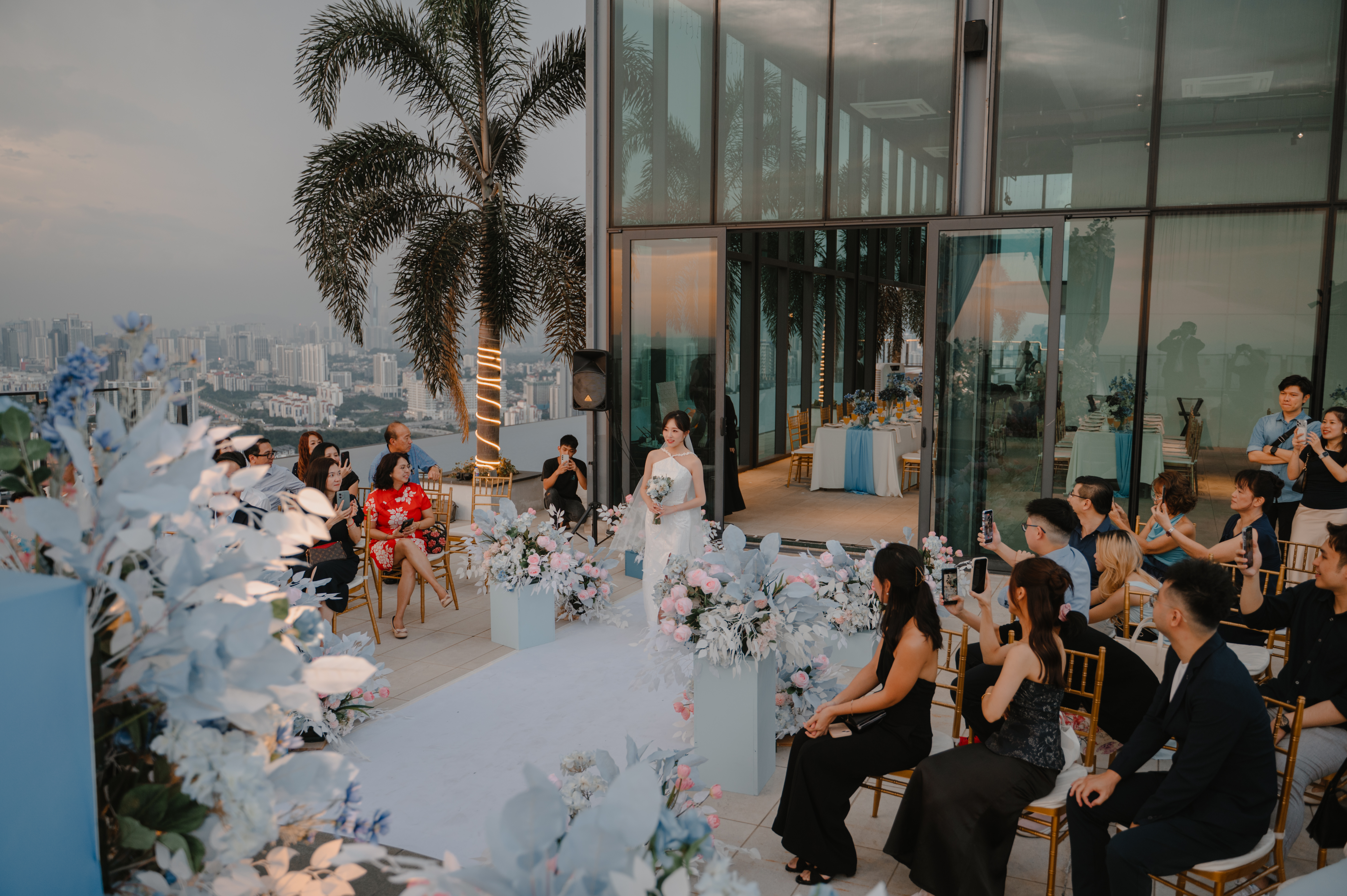 Adrian and Wendy romantic moment at sunset rooftop ceremony